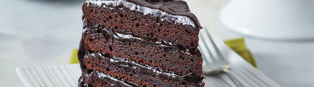 Fudge layer cake with chocolate avocado icing