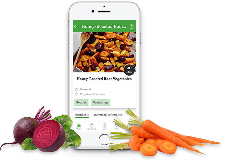 recipe-phone-img Sobeys mobile app showing recipe page for honey roasted root vegatables on smartphone with carrots and beats laid out in front of the phone