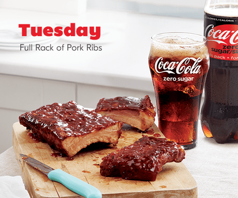 meal-3 Tuesday. Full Rack of Pork Ribs board shown with glass and bottle of coca-cola zero sugar