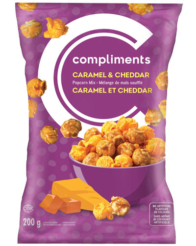 Purple Compliments bag of Compliments Cheddar and Caramel Popcorn sitting in a purple bowl on package.