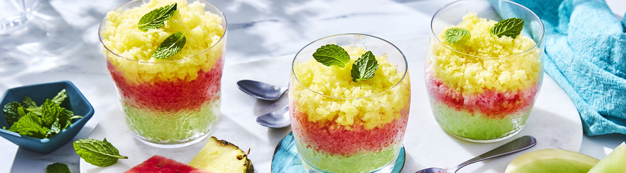 three glasses of multi-coloured melon Tropical Fruit Granitas