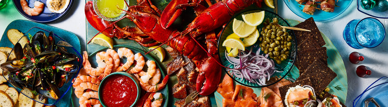 A holiday sea-cuterie board with various shellfish and seafood