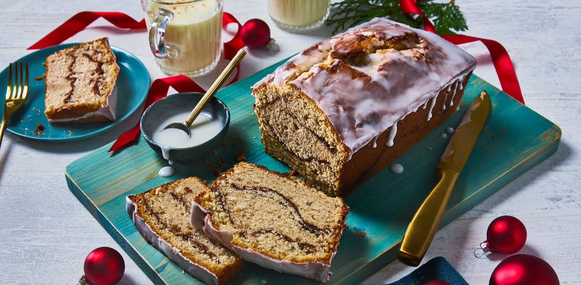 Eggnog loaf on a cutting board sliced