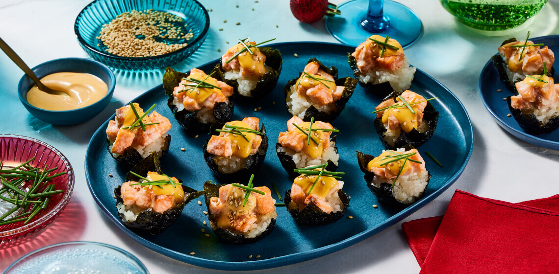 Plate of sushi baked cups topped with salmon