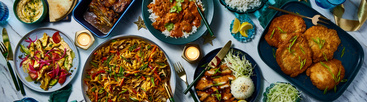 Overhead shot of takeout meals on marble counter